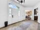Elegant entryway with view into dining room and kitchen at 310 Vista Oak Dr, Longwood, FL 32779