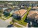 Single-story house on a tree-lined street in a residential neighborhood at 196 Aidans Lndg, Haines City, FL 33844