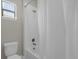 Clean bathroom with shower/tub combo and a window at 196 Aidans Lndg, Haines City, FL 33844