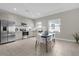 Modern kitchen with stainless steel appliances and light wood cabinets at 196 Aidans Lndg, Haines City, FL 33844