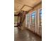 Lofted hallway with exposed brick and large windows at 601 E Ridgewood St, Orlando, FL 32803