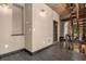 Hallway with exposed brick and wooden floors at 601 E Ridgewood St, Orlando, FL 32803