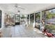 Sunroom with tiled floor and view of the backyard at 4041 Yacht Ct, Winter Park, FL 32792