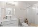 Clean bathroom with a walk-in shower, white vanity, and modern fixtures at 4041 Yacht Ct, Winter Park, FL 32792