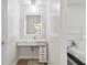 Modern bathroom with floating vanity and a large mirror at 4041 Yacht Ct, Winter Park, FL 32792