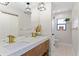 Double vanity bathroom with wood cabinets and marble countertops at 4041 Yacht Ct, Winter Park, FL 32792