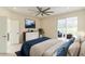 Bright bedroom with sliding doors to a patio and en-suite bathroom at 2111 Turnberry Dr, Oviedo, FL 32765