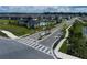 Community entrance with signage and landscaping at 5043 Prairie Preserve Run, St Cloud, FL 34772