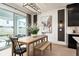 Bright dining area with sliding doors leading to a patio at 5043 Prairie Preserve Run, St Cloud, FL 34772