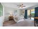 Bedroom with sliding doors leading to balcony at 466 Bouchelle Dr # 202, New Smyrna Beach, FL 32169