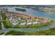 Wide aerial view of the waterfront community and surrounding area at 466 Bouchelle Dr # 202, New Smyrna Beach, FL 32169