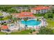 Resort-style pool and spa with surrounding lounge areas at 466 Bouchelle Dr # 202, New Smyrna Beach, FL 32169