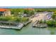 Aerial view of waterfront property with private boat slips and resort-style amenities at 466 Bouchelle Dr # 202, New Smyrna Beach, FL 32169