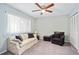 Serene bedroom with plush sofa and plenty of closet space at 466 Bouchelle Dr # 202, New Smyrna Beach, FL 32169