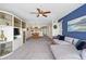 Spacious living room with sectional sofa and built-in shelving at 466 Bouchelle Dr # 202, New Smyrna Beach, FL 32169