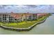 Waterfront homes with private boat docks and lush landscaping at 466 Bouchelle Dr # 202, New Smyrna Beach, FL 32169
