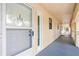 Building hallway with access to condo unit 202 at 466 Bouchelle Dr # 202, New Smyrna Beach, FL 32169