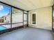 Spacious screened patio overlooking the pool, with access to the backyard at 3130 Willow Oak Dr, Edgewater, FL 32141
