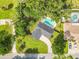 Aerial view showing house, pool, and driveway at 3130 Willow Oak Dr, Edgewater, FL 32141