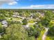 Aerial view of a quiet residential neighborhood with lush greenery at 3130 Willow Oak Dr, Edgewater, FL 32141