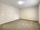 Spacious bedroom featuring neutral walls and plush carpeting at 3130 Willow Oak Dr, Edgewater, FL 32141