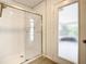 Clean shower with subway tile and glass enclosure at 3130 Willow Oak Dr, Edgewater, FL 32141