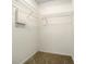 Walk-in closet with wire shelving; ready for your belongings at 3130 Willow Oak Dr, Edgewater, FL 32141