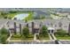 Community of townhouses near a pond at 770 Pebble Beach Dr, Davenport, FL 33896