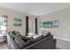 Spacious living room with sectional sofa and TV at 770 Pebble Beach Dr, Davenport, FL 33896