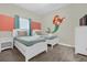 Two twin beds in a ' bedroom with mermaid decor at 770 Pebble Beach Dr, Davenport, FL 33896