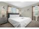 Spacious bedroom with king-size bed and two nightstands at 770 Pebble Beach Dr, Davenport, FL 33896