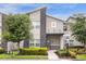 Modern two-story townhome with stone accents at 770 Pebble Beach Dr, Davenport, FL 33896
