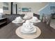 Close up of a modern dining table setting at 770 Pebble Beach Dr, Davenport, FL 33896
