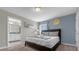 Bedroom with a queen-size bed and ensuite bathroom at 770 Pebble Beach Dr, Davenport, FL 33896