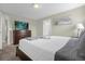 Bedroom with a king-size bed and ensuite bathroom at 770 Pebble Beach Dr, Davenport, FL 33896