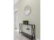 Bright entryway with console table and mirror at 770 Pebble Beach Dr, Davenport, FL 33896