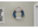 Nautical-themed wall decor in entryway at 770 Pebble Beach Dr, Davenport, FL 33896