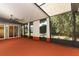 Relaxing screened porch with view of lush backyard landscaping at 259 New Waterford Pl, Longwood, FL 32779