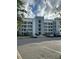 Exterior view of building with parking lot at 3131 Paradox Cir # 206, Kissimmee, FL 34746