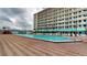 Refreshing pool area with plenty of lounge chairs at 701 S Atlantic Ave # 508, Daytona Beach, FL 32118