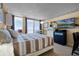 King-size bed, ocean view, and flat-screen TV at 701 S Atlantic Ave # 508, Daytona Beach, FL 32118