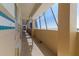 Building hallway with tiled floors and ocean view at 701 S Atlantic Ave # 508, Daytona Beach, FL 32118