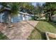 Home with a spacious backyard and brick patio at 3202 Montclair Rd, Orlando, FL 32806