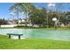 Community basketball court with green surface and bench at 1538 Echo Lake Ct, Orlando, FL 32828