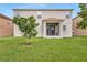 Two-story house with backyard and covered patio at 1769 Morning Sky Dr, Winter Garden, FL 34787