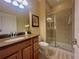 Bathroom with shower and single vanity at 8958 Candy Palm Rd, Kissimmee, FL 34747