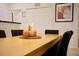 Wooden dining table with orange candles and decor at 3004 Red Ginger Rd, Kissimmee, FL 34747