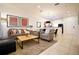 Bright living room with gray sofas, a coffee table, and open floor plan at 3004 Red Ginger Rd, Kissimmee, FL 34747