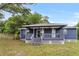 Charming house exterior with a covered porch and nice landscaping at 10 Locust Run Crse, Ocala, FL 34472