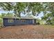 Charming home with a spacious backyard, perfect for outdoor activities at 10 Locust Run Crse, Ocala, FL 34472